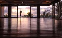 <p>“There's something incredibly special about doing <a rel="nofollow noopener" href="http://www.travelandleisure.com/travel-guide/tulum/hotels/sanara-tulum" target="_blank" data-ylk="slk:yoga in Tulum;elm:context_link;itc:0;sec:content-canvas" class="link ">yoga in Tulum</a>, as cliche as that sounds. My favorite place to take a class is at the <a rel="nofollow noopener" href="http://www.travelandleisure.com/travel-guide/tulum/things-to-do/yoga-at-sanara" target="_blank" data-ylk="slk:Sanara hotel;elm:context_link;itc:0;sec:content-canvas" class="link ">Sanara hotel</a>, which has a beautiful pavilion with views of the water. The teachers are excellent and the classes are great for any level of yogi. After a rejuvenating class, head to the Real Coconut, the juice bar next door, to refuel with a smoothie.” <em>- Steph Wu, Senior Editor</em></p>