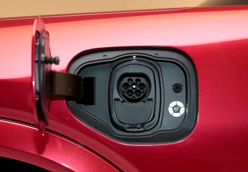 FILE PHOTO: The charging socket is seen on Ford Motor Co's all-new electric Mustang Mach-E vehicle during a photo shoot at a studio in Warren, Michigan