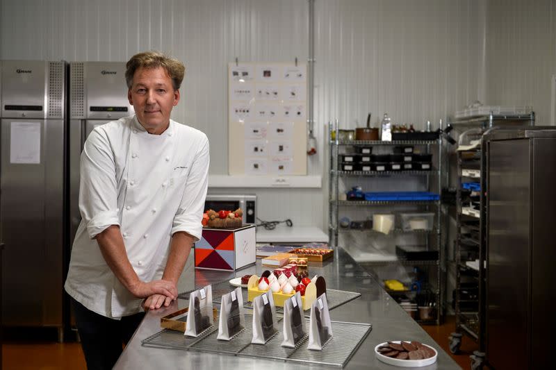 Belgian chocolatier Pierre Marcolini poses in his kitchen workshop after being crowned best pastry chef in the world by his peers at international competition, in Brussels