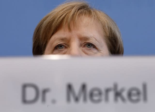 German Chancellor Angela Merkel takes part in a news conference about the coronavirus outbreak in Germany in Berlin