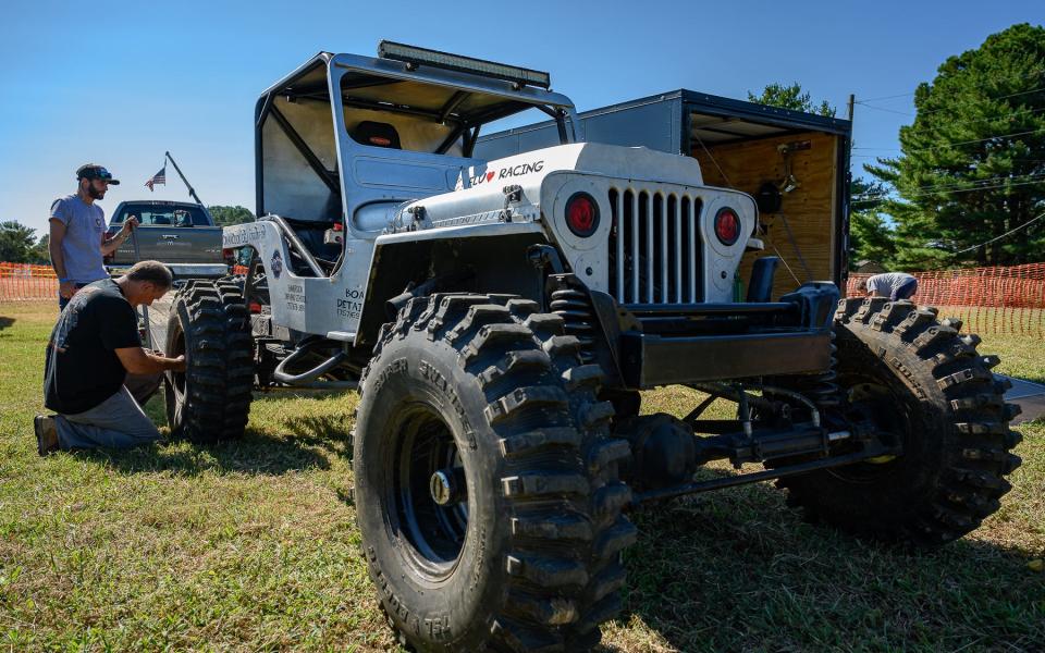 Local team Fluhart Racing do a check on their Jeep before a race at Muddin' at the Moose.