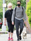 <p>Hugh Jackman and wife Deborra-Lee Furness step out on Tuesday to walk their dogs. </p>