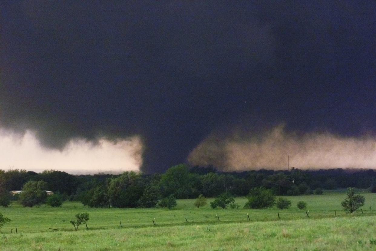 On May 3, 1999, The Oklahoman's photographer Paul Hellstern captured this image of the dark and relentless tornado that would grow to an estimated mile in width, tearing a heavily destructive path through Bridge Creek, Newcastle, Moore, Oklahoma City, Del City and Midwest City. Thirty-six people directly lost their lives in the storm and 1,800 homes were destroyed.