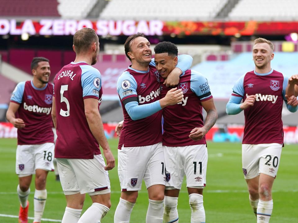 West Ham captain Mark Noble (centre left) celebrates with Jesse Lingard (Getty Images)