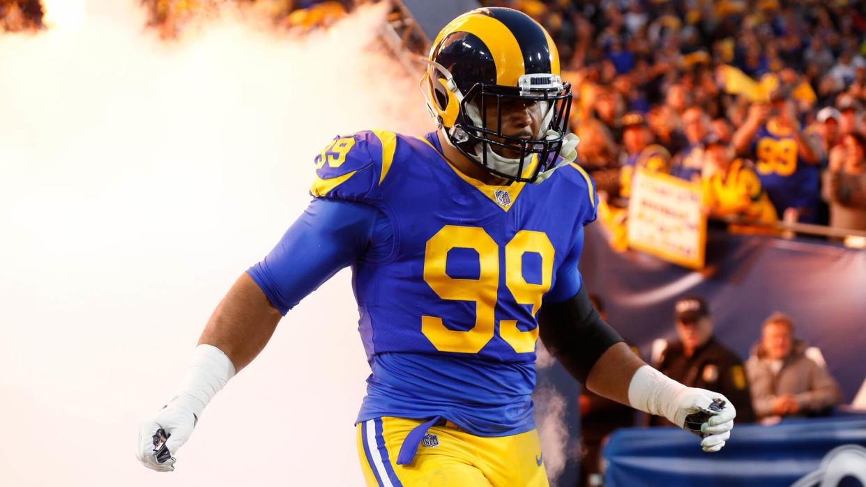 Los Angeles Rams defensive end Aaron Donald #99 runs onto the field before the NFC Divisional Round playoff game between the Los Angeles Rams and the Dallas Cowboys at the Los Angeles Coliseum in Los Angeles, CaliforniaNFL NFC Divisional Playoff Cowboys vs Rams, Los Angeles, USA - 12 Jan 2019.