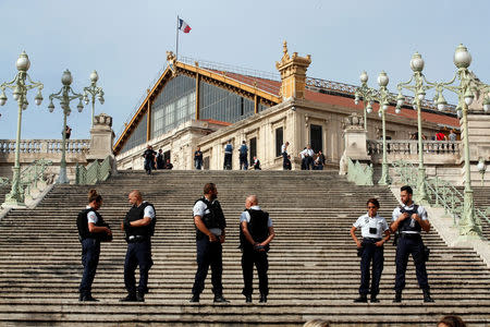 Police secure the area outside the Saint-Charles train station after French soldiers shot an killed a man after he stabbed two women to death at the main train station in Marseille, France, October 1, 2017. REUTERS/Jean-Paul Pelissier