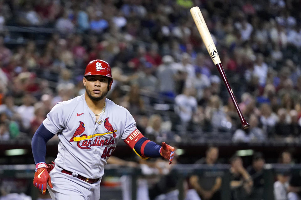 St. Louis Cardinals' Willson Contreras flips the bat away after earning a walk against the Arizona Diamondbacks during the ninth inning of a baseball game Monday, July 24, 2023, in Phoenix. The Cardinals won 10-6. (AP Photo/Ross D. Franklin)