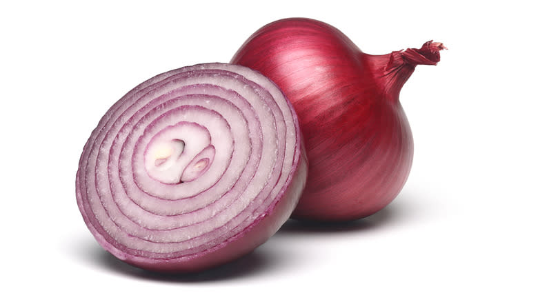 sliced red onion white background