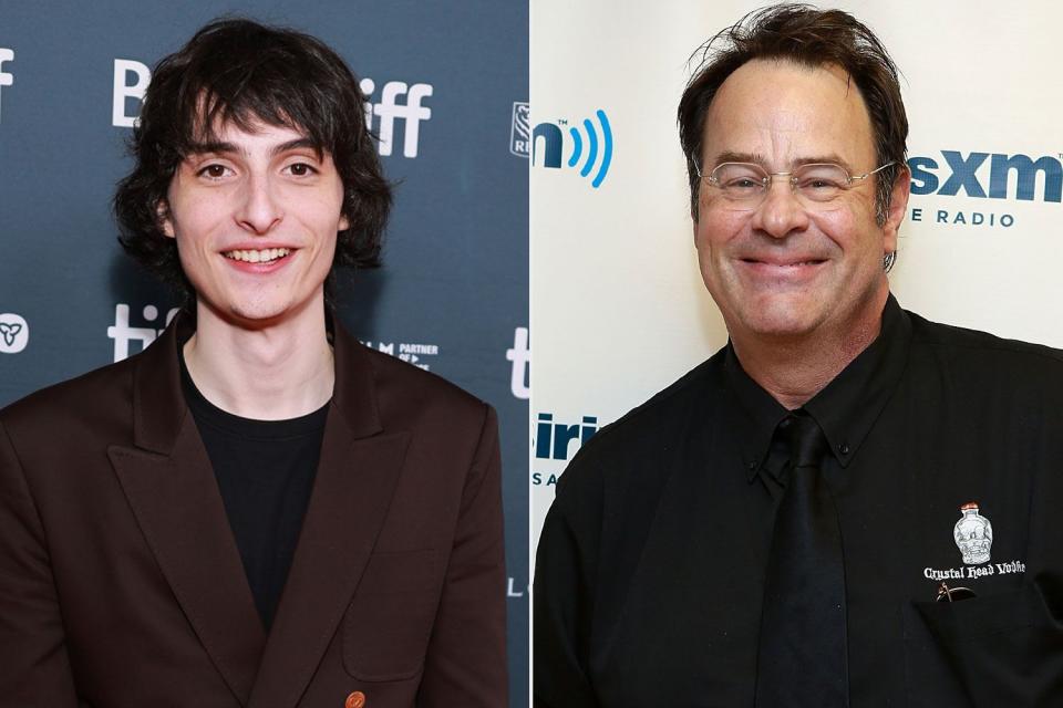 <p>Matt Winkelmeyer/Getty, Robin Marchant/Getty</p> Finn Wolfhard; Dan Aykroyd