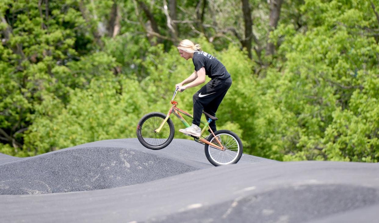 Kyler McCammon, 17, of Sebring  rides the new pump track at Memorial Park which was recently opened for bike riders.  Tuesday,  May 23, 2023.