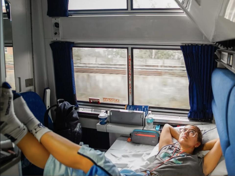 The author relaxes in an Amtrak bedroom traveling from Miami to NYC.