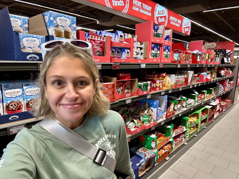 terri posing for a selfie in the aldi finds aisle at aldi