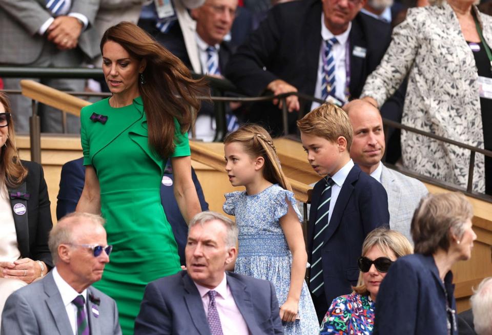 PHOTO: Catherine, Princess of Wales, Princess Charlotte of Wales, Prince George of Wales and Prince William, Prince of Wales, are seen in the Royal Box on day fourteen of The Championships Wimbledon 2023, July 16, 2023, in London. (Julian Finney/Getty Images)