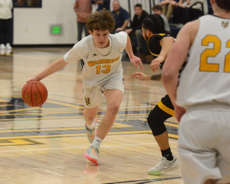 Norwich Tech senior Connor McRae makes his move during the Warriors' 69-52 win over Kaynor Tech at Norwich.