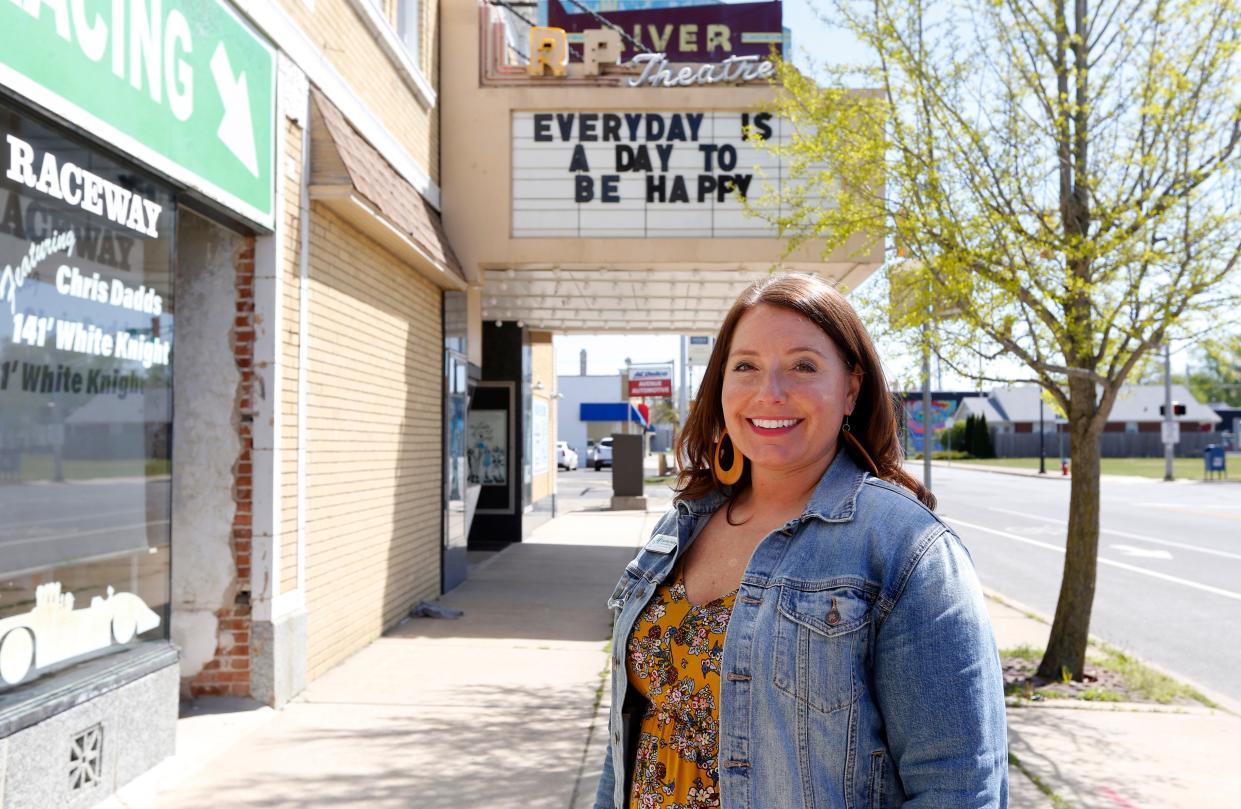 Courtney Kubly, director of business development for Downtown South Bend Inc., stands on Mishawaka Avenue at 30th Street on Monday, April 22, 2024, in an area where businesses are taking advantage of the new downtown liquor license program. The licenses are expected to help neighborhood districts like River Park.