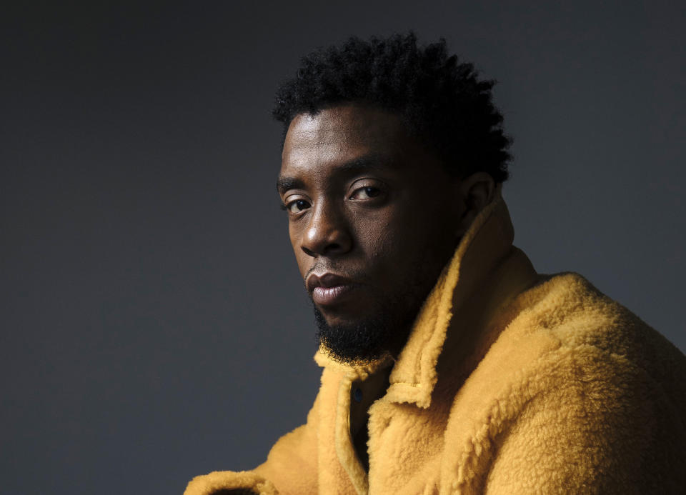 FILE - In this Feb. 14, 2018 photo, actor Chadwick Boseman poses for a portrait in New York to promote his film, "Black Panther." Boseman, who played Black icons Jackie Robinson and James Brown before finding fame as the regal Black Panther in the Marvel cinematic universe, has died of cancer. His representative says Boseman died Friday, Aug. 28, 2020 in Los Angeles after a four-year battle with colon cancer. He was 43. (Photo by Victoria Will/Invision/AP)