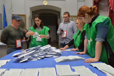 Election Commission officials count votes after presidential election at a polling station in Kutaisi, Georgia, October 28, 2018. REUTERS/Tornike Turabelidze