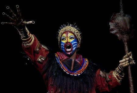 Actress Brenda Mhlongo dressed as "Rafiki" performs during the press rehearsal of "El Rey Leon" ("The Lion King") musical shows in Madrid October 13, 2011. REUTERS/Sergio Perez