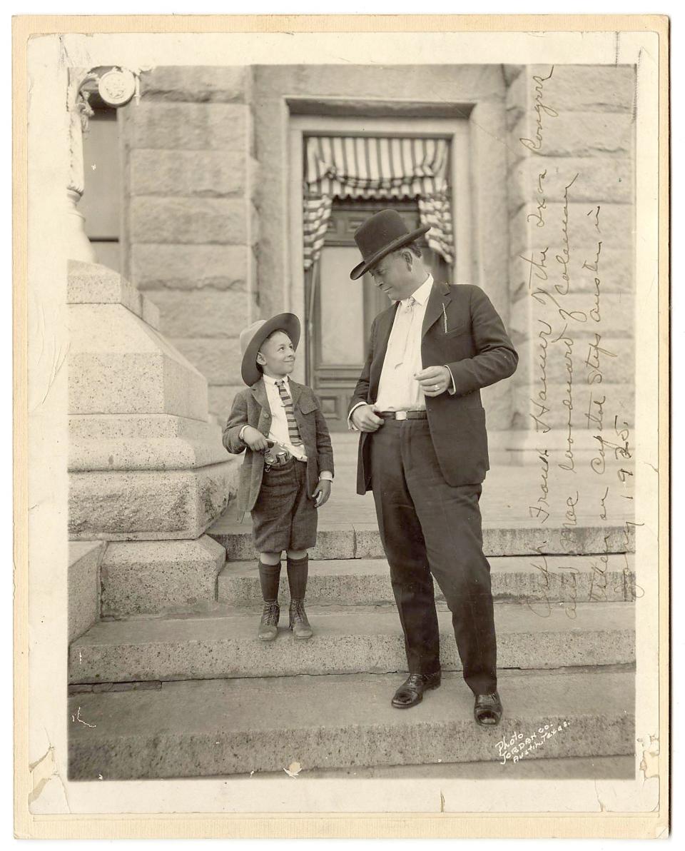 A January 1925 photograph of Capt. Frank Hamer of the Texas Rangers standing on the Texas Capitol beside young Walter M. Woodward. Woodward wears an overly large hat and has a revolver stuffed into his pants. Hamer was involved in the killing of Bonnie and Clyde in 1934.