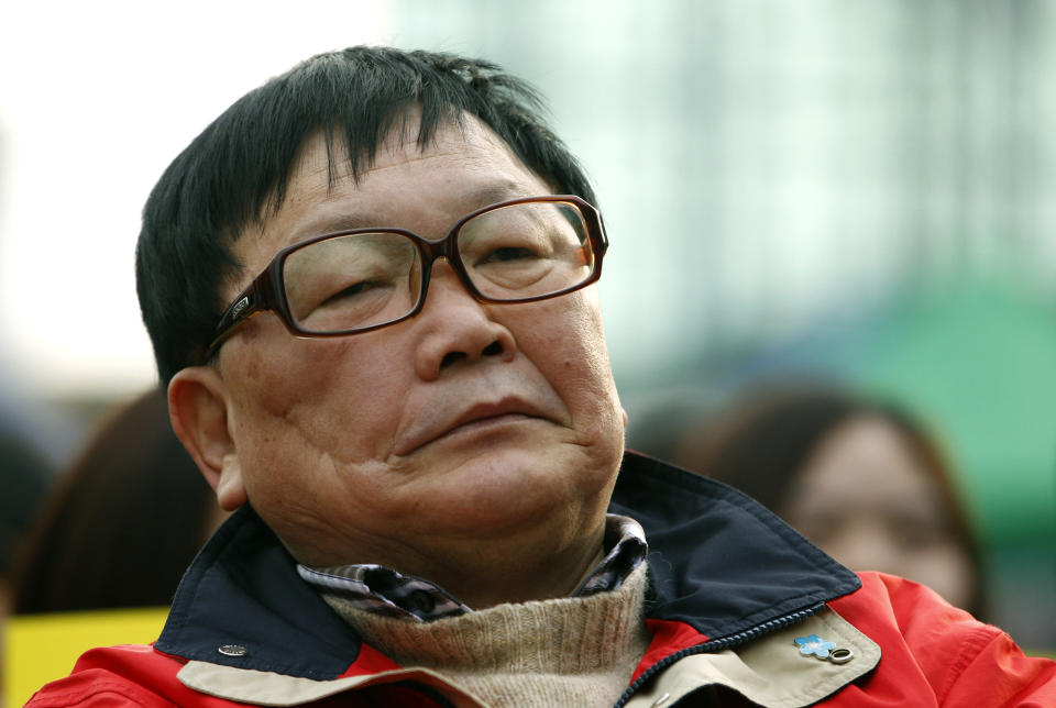 In this photo taken on Dec. 9, 2011, Oh Kil-nam, a South Korean, who defected with his family to the communist North after being lured by promises of an important job and free medical treatment for his ill wife, and then later fled the country leaving his family behind, shouts slogans during a rally denouncing North Korea's alleged genocide and crimes against humanity in Seoul, South Korea. (AP Photo/Lee Jin-man)