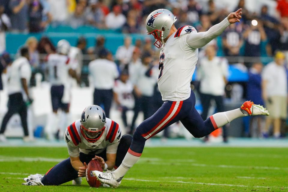 New England Patriots kicker Nick Folk attempts a field goal against the Miami Dolphins on Jan. 9, 2022, at Hard Rock Stadium in Miami.