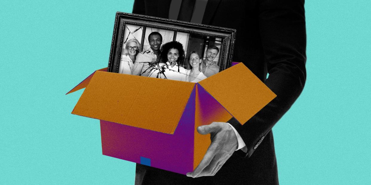 Business man holding box with cracked work family photo frame popping out 2x1