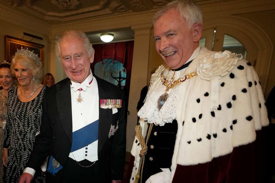 <p>Kirsty Wigglesworth - WPA Pool/Getty</p> King Charles and Queen Camilla attend a reception and dinner at Mansion House on October 18.