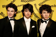 <p>The Jonas Brothers were so big in 2008 that they attended the White House Correspondents’ Dinner. Looking good, guys! (Photo: Paul Morigi/WireImage) </p>