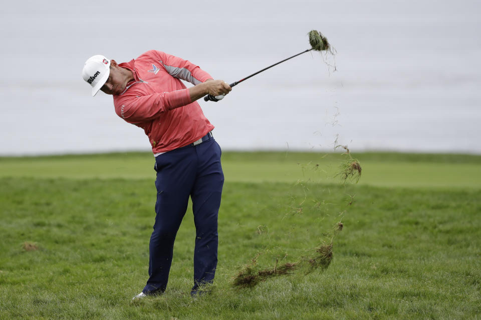 Gary Woodland hits from the rough on the 11th hole during the final round of the U.S. Open Championship golf tournament Sunday, June 16, 2019, in Pebble Beach, Calif. (AP Photo/Marcio Jose Sanchez)