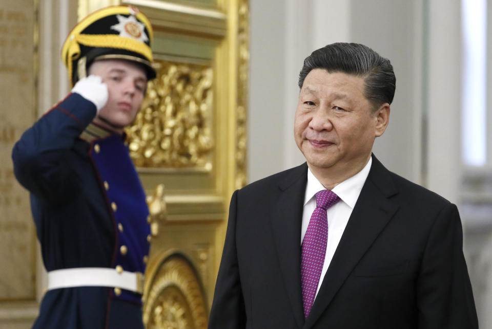 Chinese President Xi Jinping arrives for a meeting with Russian President Vladimir Putin in Kremlin in Moscow, Russia, Wednesday, June 5, 2019. Chinese President Xi Jinping is on visit to Russia this week and is expected to attend Russia's main economic conference in St. Petersburg. (Evgenia Novozhenina/Pool Photo via AP)