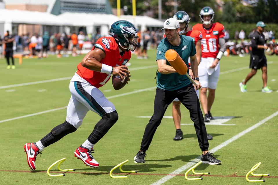 Philadelphia Eagles quarterback Jalen Hurts runs a drill during a joint practice with the Cleveland Browns at the Novacare Complex in Philadelphia, Tuesday, Aug. 15, 2023.