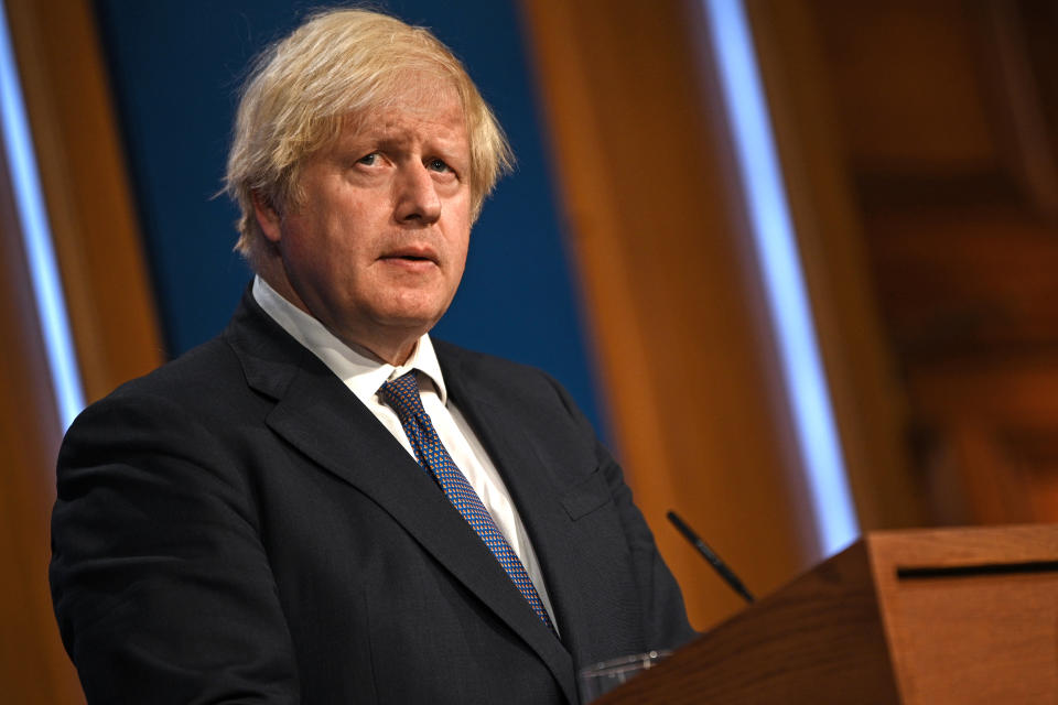 LONDON, ENGLAND - JULY 12: British Prime Minister Boris Johnson gives an update on relaxing restrictions imposed on the country during the coronavirus covid-19 pandemic at a virtual press conference inside the Downing Street Briefing Room on July 12, 2021 in London, England.  The government plans to end most Covid-19 social restrictions, such as the legal mandate to wear masks and distancing rules, in England on July 19. (Photo by Daniel Leal-Olivas-WPA Pool/Getty Images)