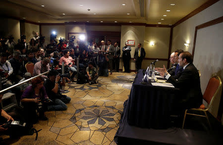 Emilio Lozoya, former chief Executive Officer of Petroleos Mexicanos (Pemex) speaks next to his lawyers Javier Coello Trejo and Javier Coello Zuarth during a news conference at a hotel after he leaves Mexico's attorney general's office, in Mexico City, Mexico August 17, 2017. REUTERS/Henry Romero