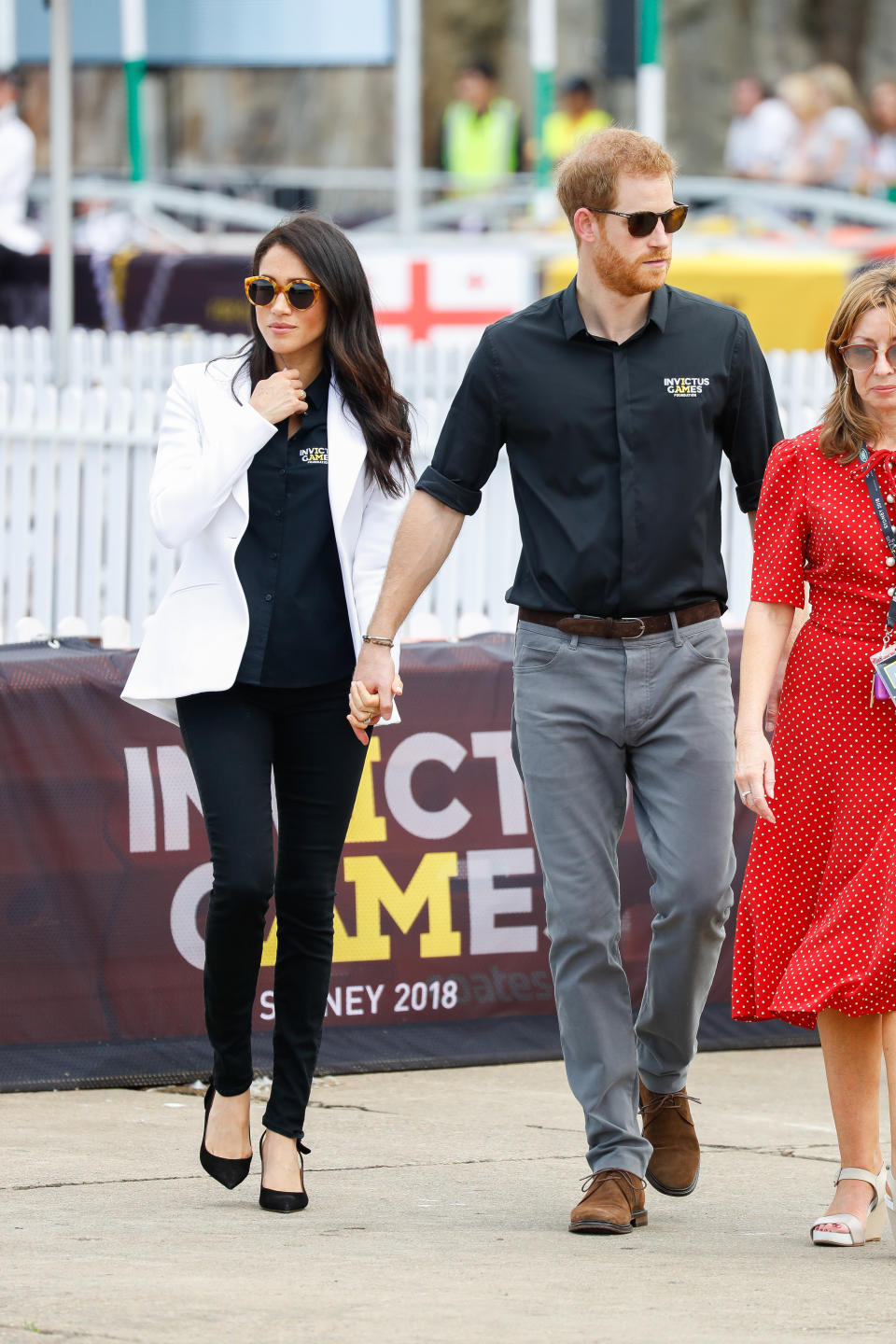 <p>She was spruiking the event in an Invictus Games polo shirt which she paired with black jeans from Mother Denim (AU$275), a white blazer from Altuzzara ($2,200) and the same Tabitha Simmons heels ($1,000). Source: Getty </p>