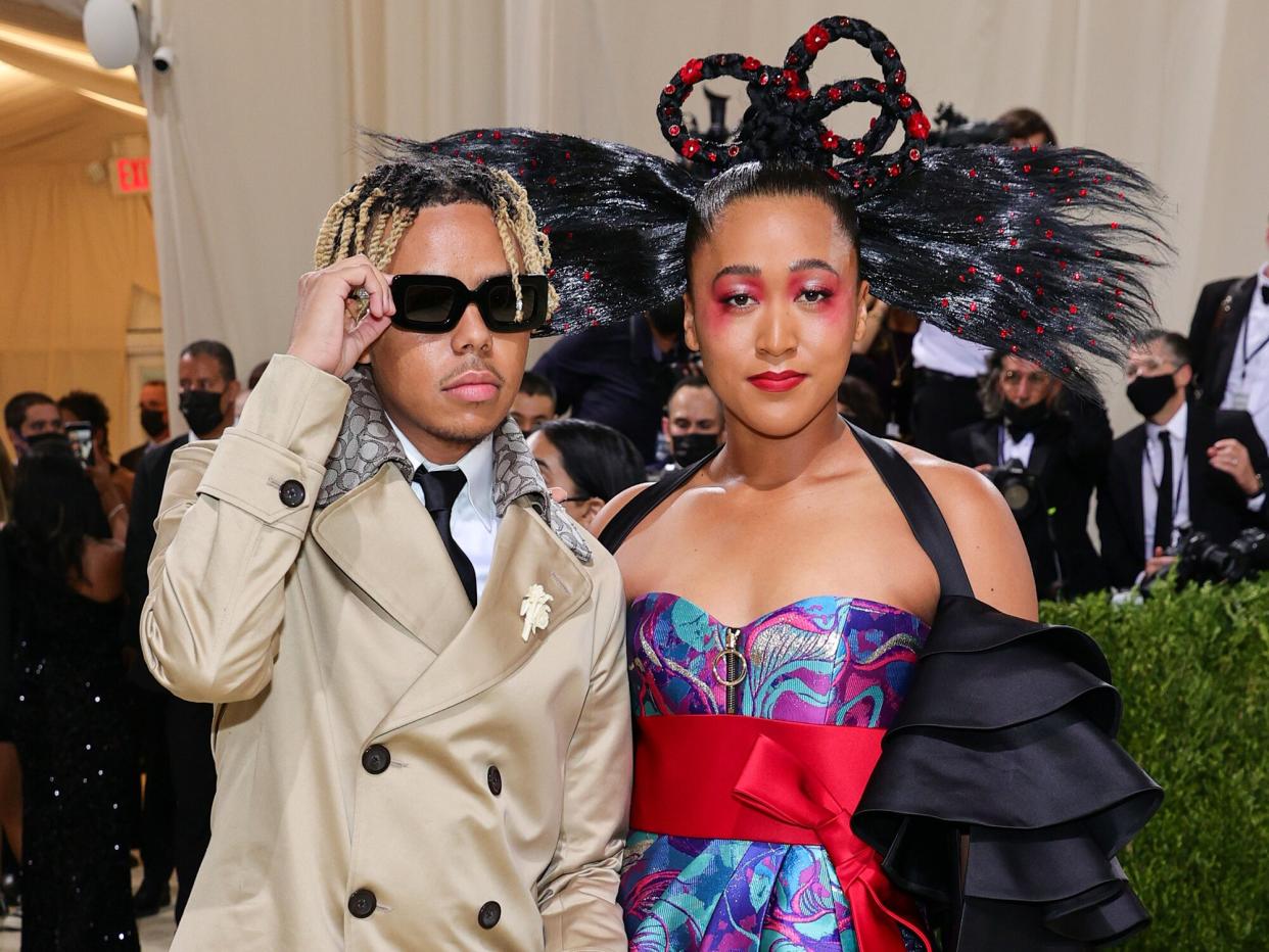 Cordae and Naomi Osaka attend The 2021 Met Gala Celebrating In America: A Lexicon Of Fashion at Metropolitan Museum of Art on September 13, 2021 in New York City