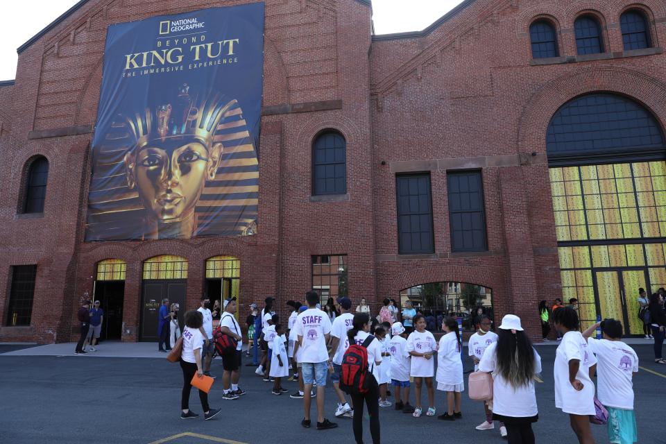 Children from Boston Centers for Youth & Families attend opening day of "Beyond King Tut: The Immersive Experience" at the SoWa Power Station in Boston on July 8, 2022.