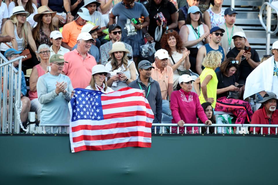 Tennis fans watch Coco Gauff and Jessica Pegula take on Desirae Krawczyk and Caroline Dolehide in their second-round doubles match on Stadium 3 at the BNP Paribas Open in Indian Wells, Calif., on Monday, March 11, 2024.