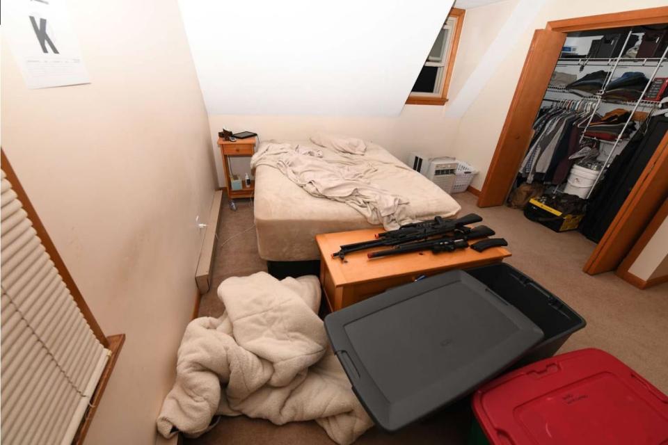 Photo of room in North Dighton home where Jack D. Teixeira lived, entered into evidence by federal government in case against him. A defense attorney wrote that the guns at the bottom of the bed are "airsoft toys."