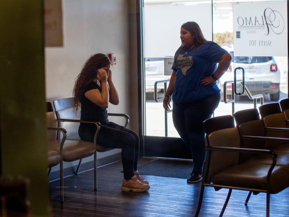 A patient is brought to tears as a staff member informs her that the clinic can no longer provide services after moments earlier the Supreme Court overturned Roe v. Wade shutting down abortion services at Alamo Womens Reproductive Services on June 24, 2022 in San Antonio, Texas.