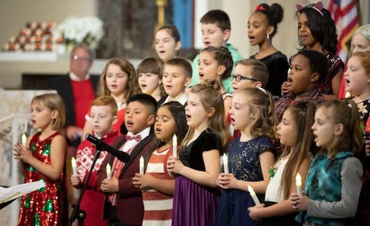 The Franklin Elementary School Sixteenth Street Singers will once again entertain crowds at the Festival of Music and Candlelighting Ceremony at St. Mary Catholic Church, 206 Cherry Road NE, during the annual Community Candlelight Walk.