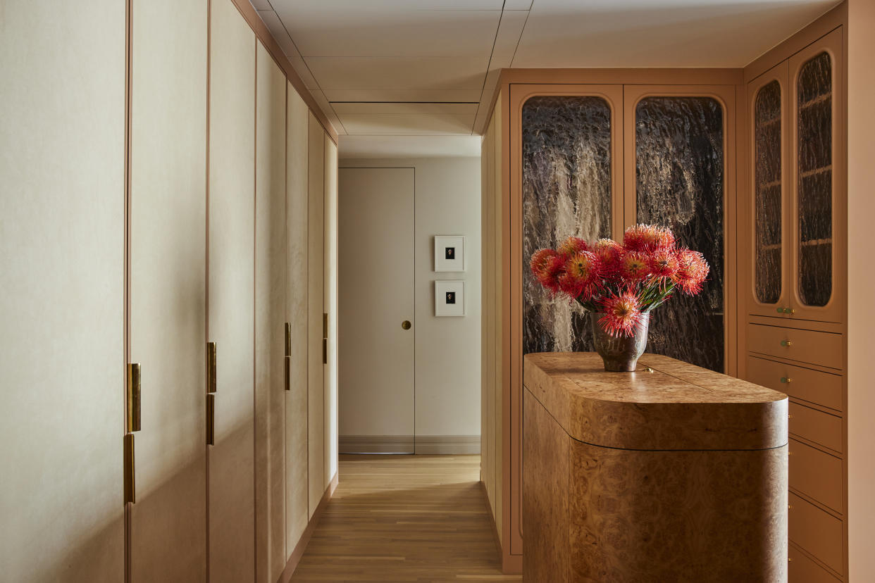  Modern wood cupboards in a bedroom. 