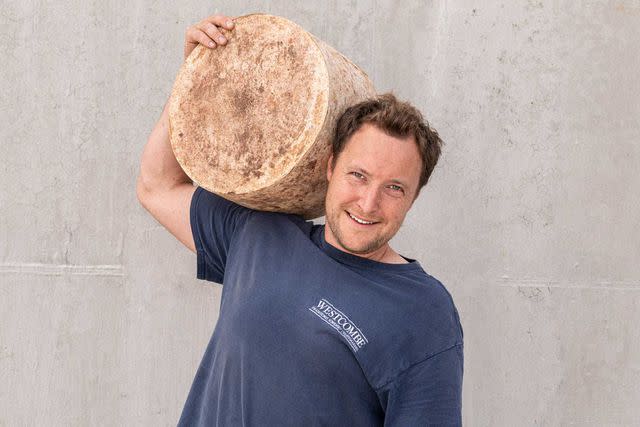 <p>Matt Austin/Courtesy of Westcombe Dairy</p> Tom Calver, cheesemonger at Westcombe Dairy, in Somerset.