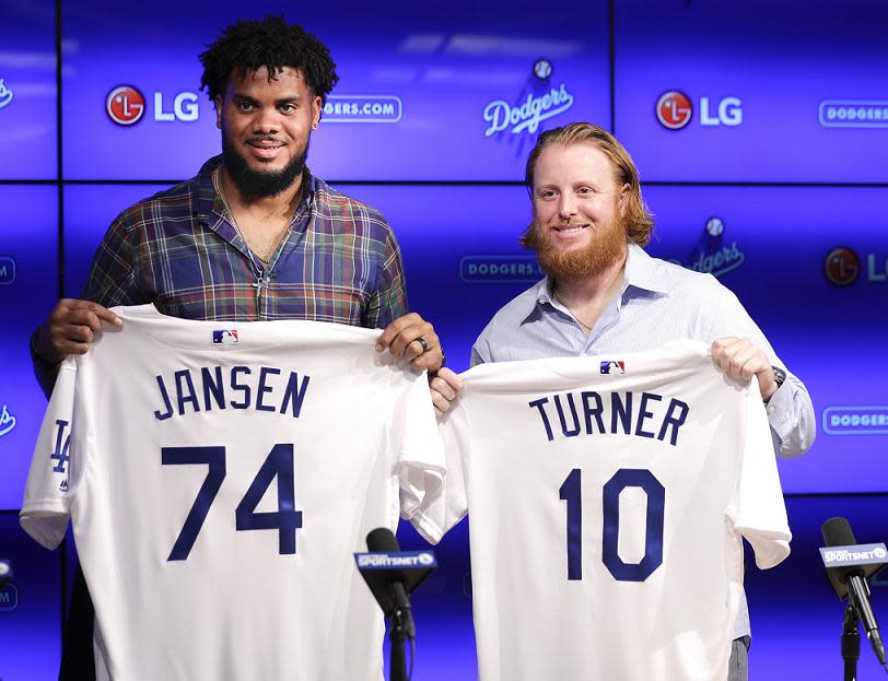 Dodgers closer Kenley Jansen (left) and third baseman Justin Turner agreed to return to LA at Jansen’s offseason wedding. (AP)