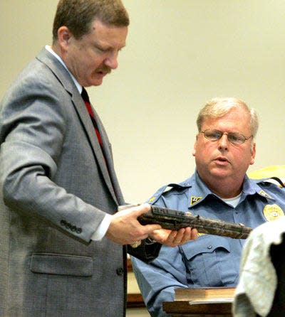 Photo by Amy Paterson/New Jersey Herald - Assistant Prosecutor Francis Koch asks Sparta Police Chief Ernest Reigstad about a sawed-off rifle that ballistics show was used to kill Alan Thropp in November 2006 during the bench trial of Daniel Thropp.