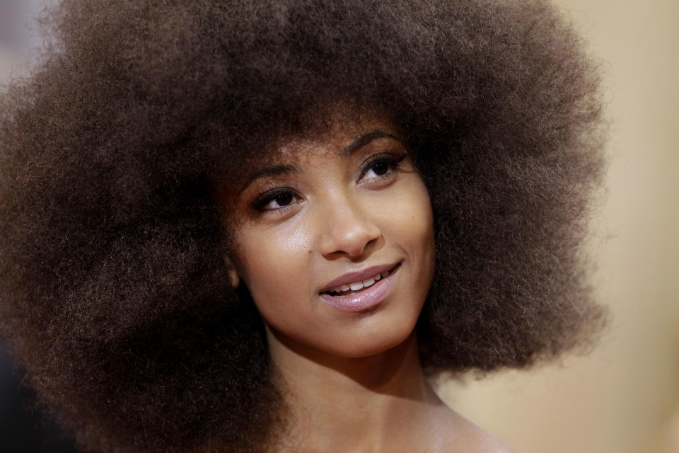 FILE - In this Feb. 26, 2012 file photo, musician Esperanza Spalding arrives before the 84th Academy Awards in the Hollywood section of Los Angeles. Spalding's latest album, "Radio Music Society," was released this week. (AP Photo/Amy Sancetta, file)