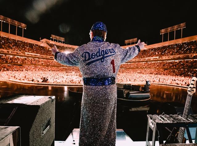 Elton John gets legendary sequined Dodgers uniform back from the Hard Rock  Cafe