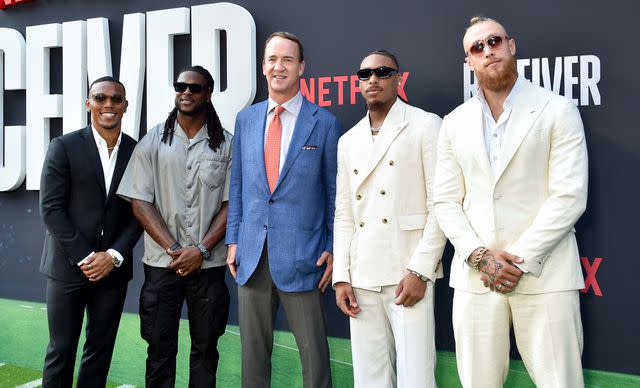 <p>Gregg DeGuire/Variety via Getty</p> (L-R) Amon-Ra St. Brown, Davante Adams, Peyton Manning, Justin Jefferson and George Kittle at the 'Receiver' premiere in Los Angeles on July 09, 2024