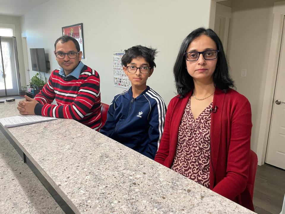 Jignesh Padia, with his wife Liza Parekh and son Arjun, says the government should revisit the Parents and Grandparents Program as it's not working for many families.