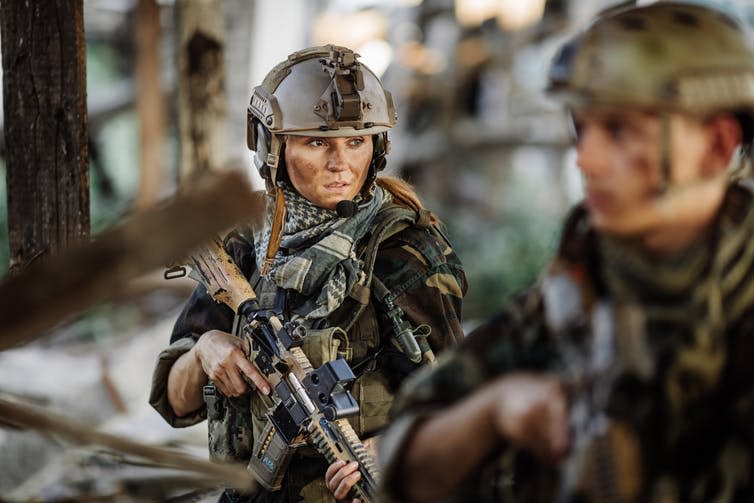 <span class="caption">Women in combat roles are increasingly common.</span> <span class="attribution"><a class="link " href="https://www.shutterstock.com/image-photo/soldier-his-wife-battlefield-area-311412740?src=JD5GFNONO04KdM4GaZ4-JA-1-11" rel="nofollow noopener" target="_blank" data-ylk="slk:Shutterstock;elm:context_link;itc:0;sec:content-canvas">Shutterstock</a></span>