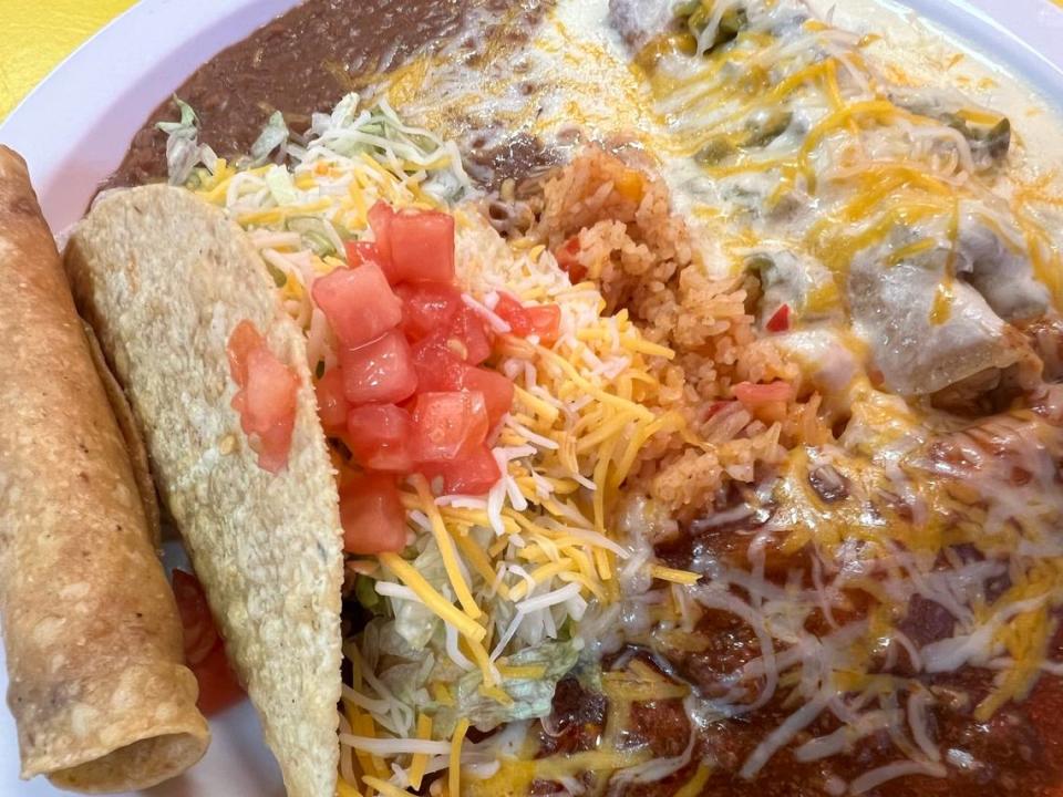 A combination plate with creamy green chile cheese enchiladas at Chente Cafe off Interstate 20 west of Weatherford.